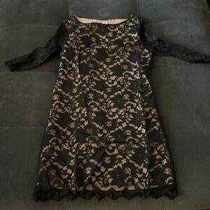 Black lace dress lined except sleeves, small, perfect condition. So cute.